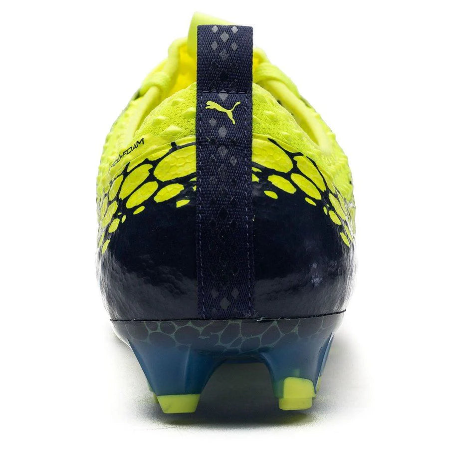 PUMA Evopower Vigor 1 Graphic FG Firm Ground Soccer Cleats Safety Yellow Silver