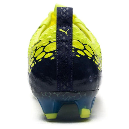 PUMA Evopower Vigor 1 Graphic FG Firm Ground Soccer Cleats Safety Yellow Silver