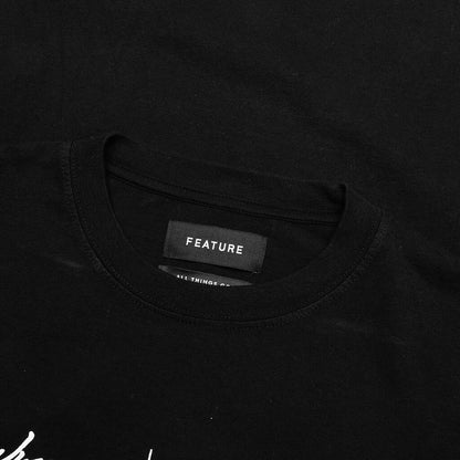 Feature x Wynn Logo Lock Up L S Tee Black